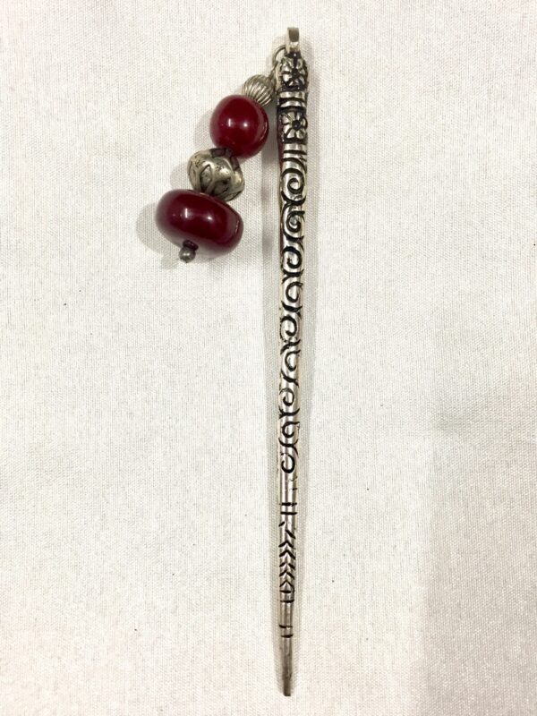 Hair stick with red beads